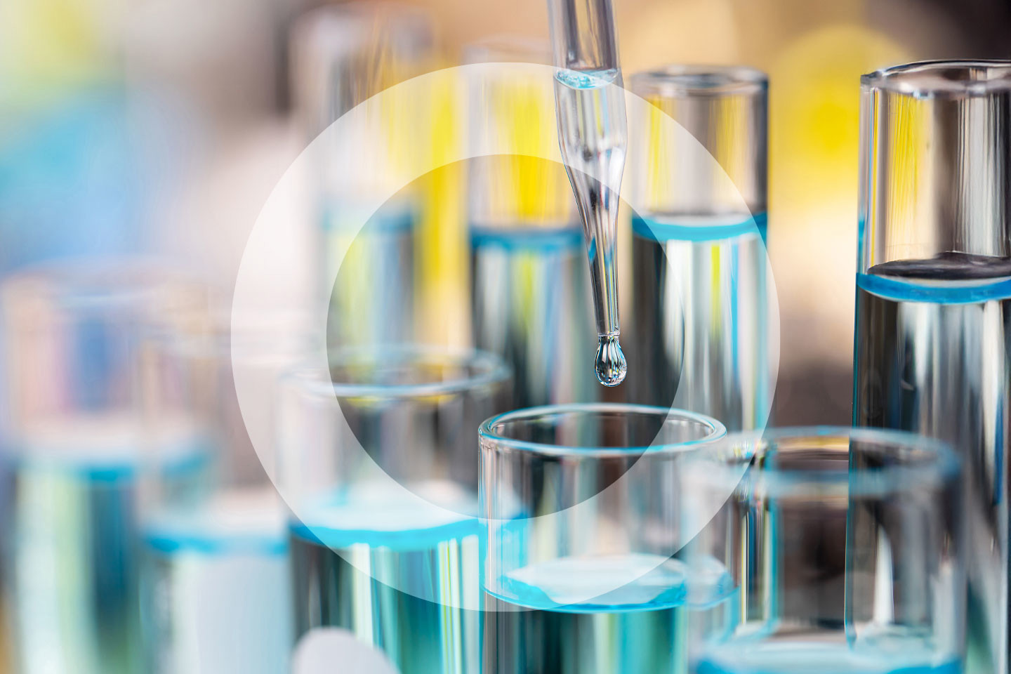 pippette with droplet over test tube with 'O' overlaid