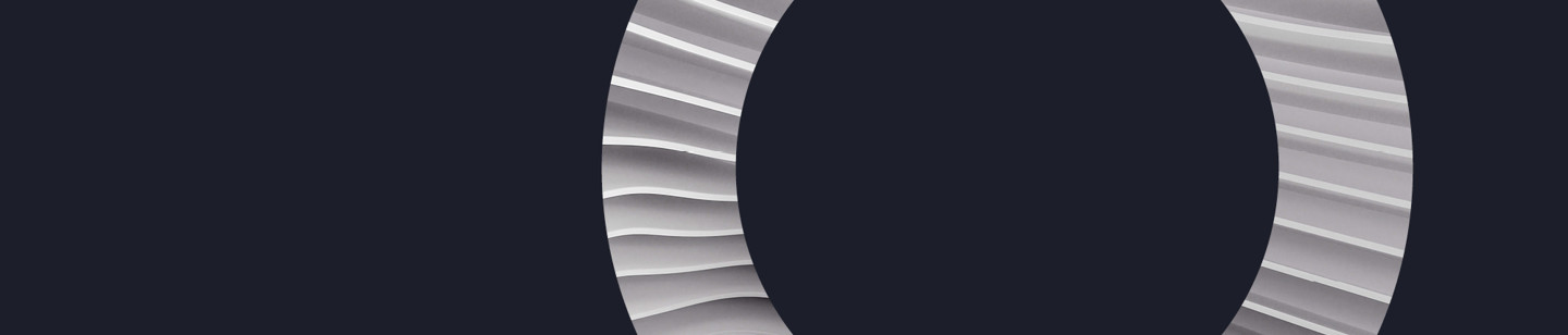 Grey 'O' with swirled pattern on black background