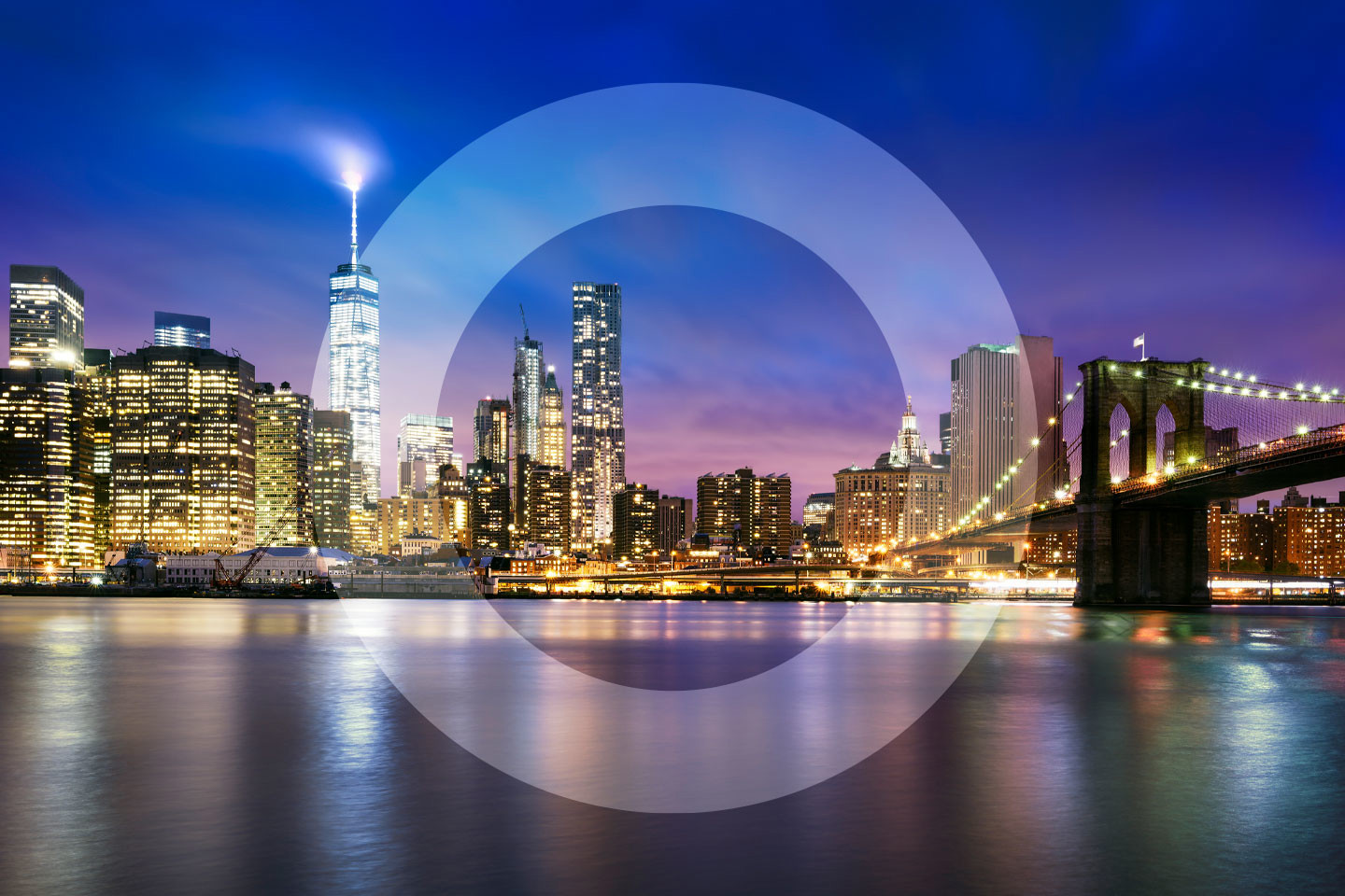 New York skyline at night with overlayed 'O'