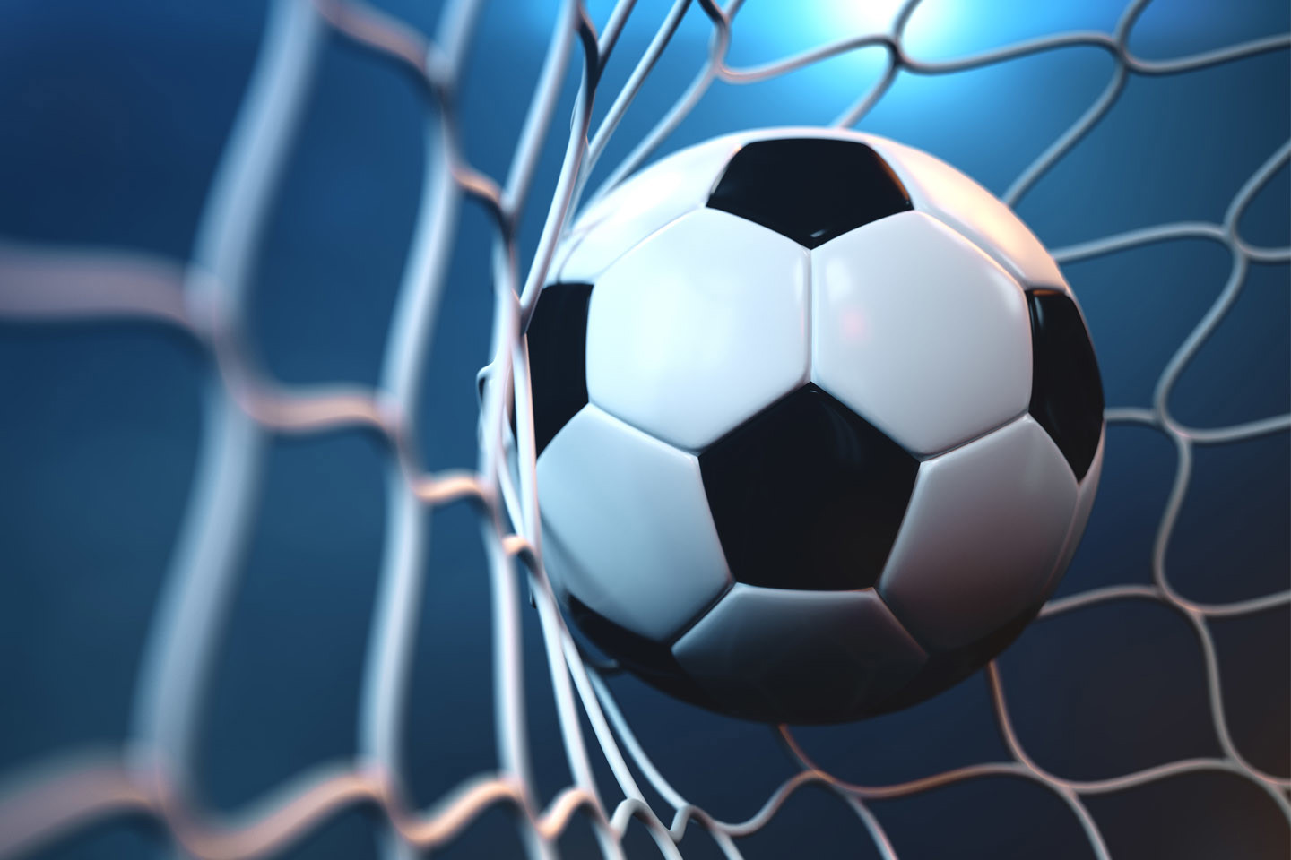 football in a net on blue background