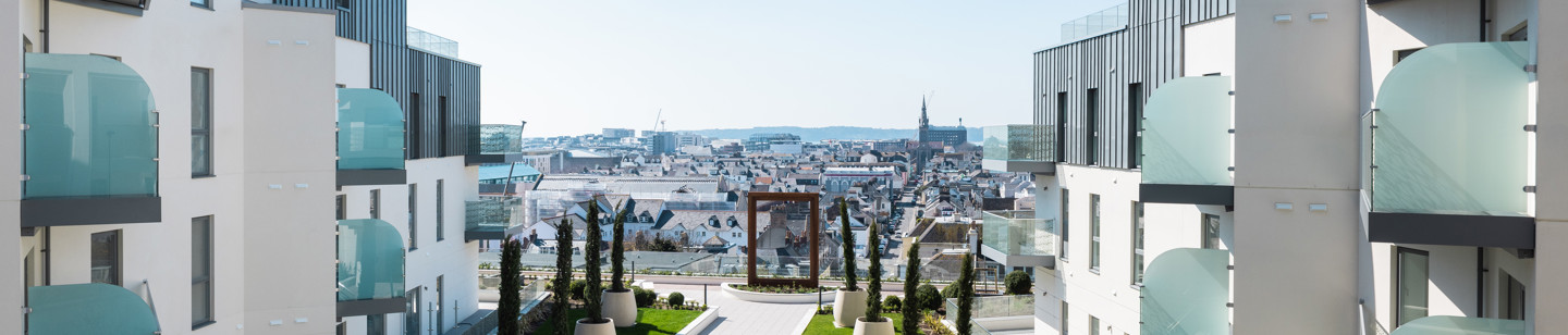 View of St Helier town in Jersey, with apartments lining both sides