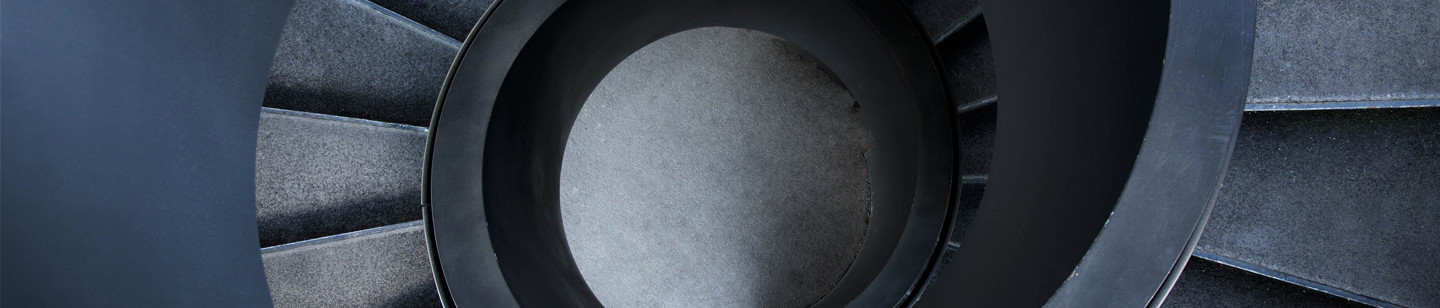 aerial view of dark metal spiral staircase