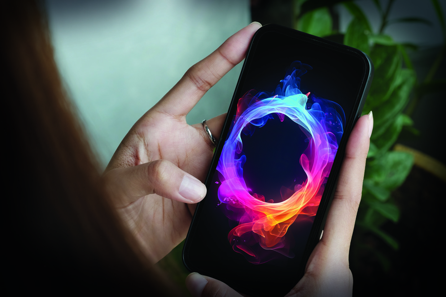 mobile phone screen with multicoloured smoke O