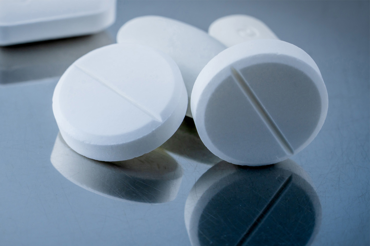 white ciruclar pills