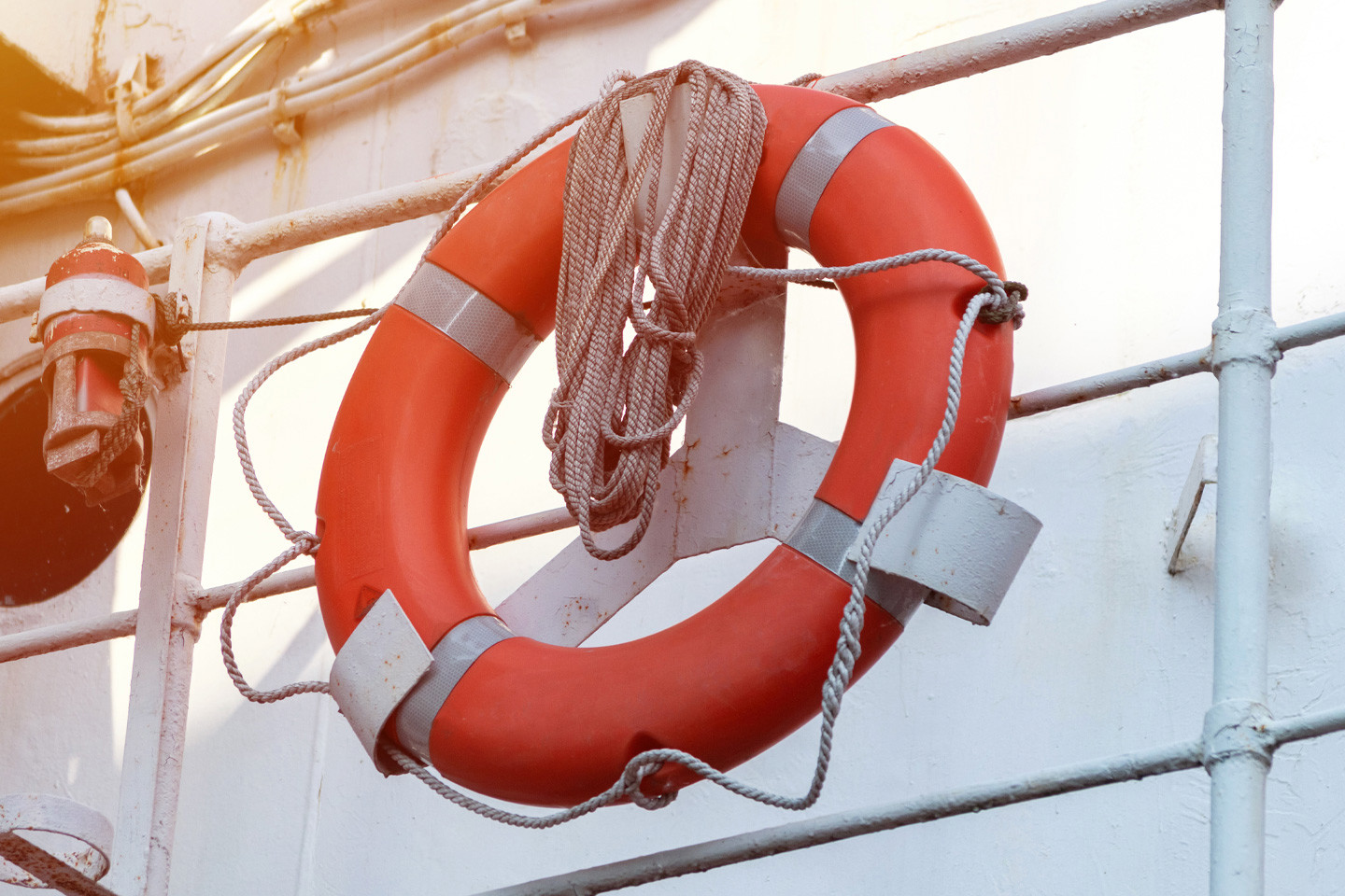 lifering connected to railing of boat