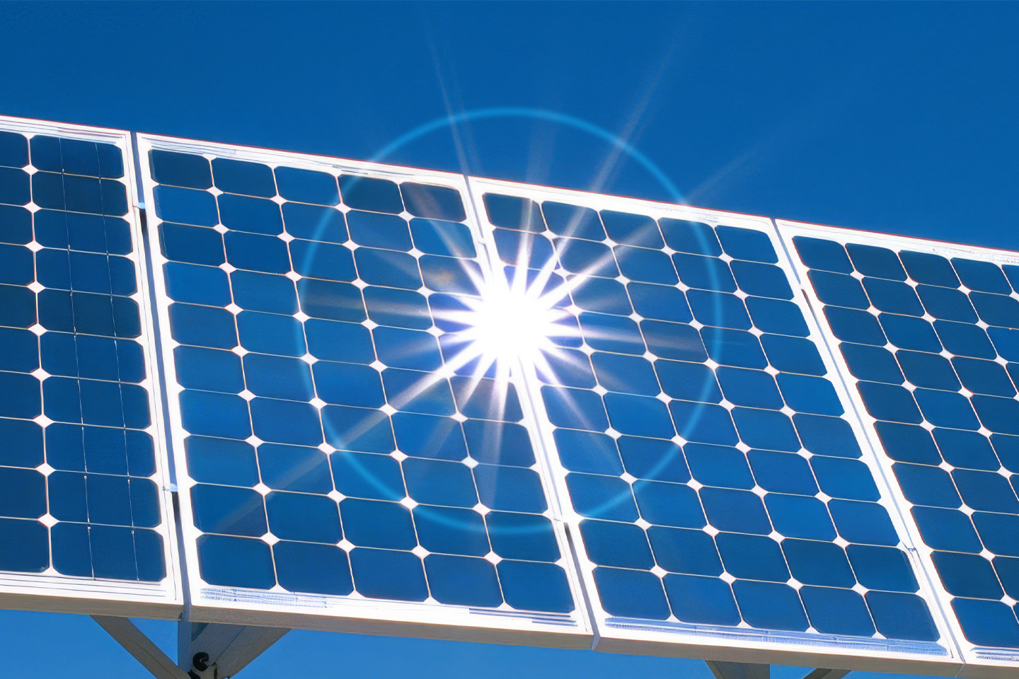 solar panel with the reflection of the sun bouncing off